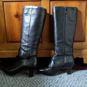 Tall black heeled boots